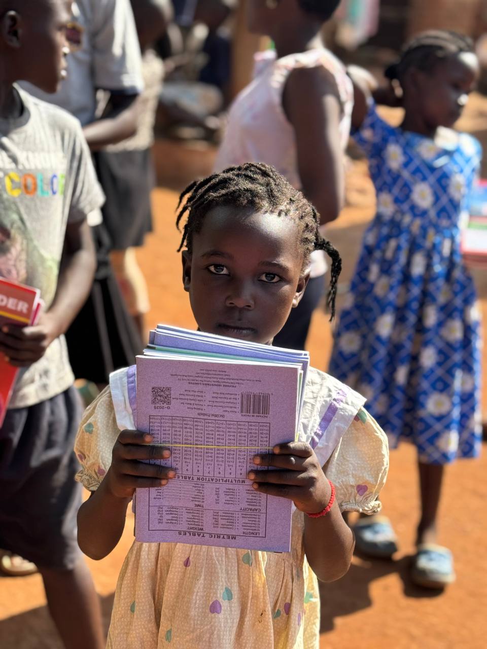 Children with new school books